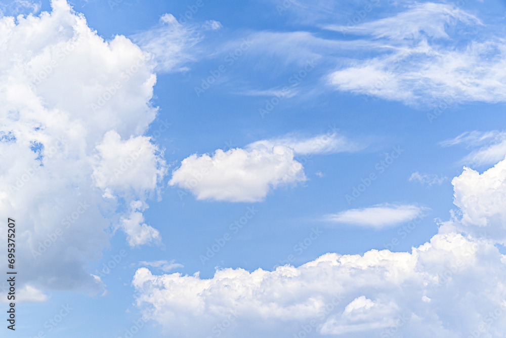 White clouds in a bright blue sky. The beauty of the nature