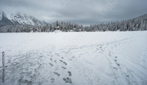 Tracks on frozen Emerald Lake in Yoho National Park, British Columbia, Canada