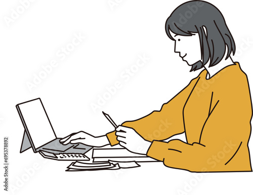 会計ソフトに記帳する女性