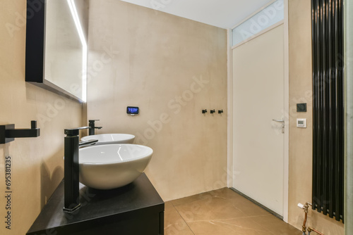Modern bathroom with stylish basin and minimalist design photo