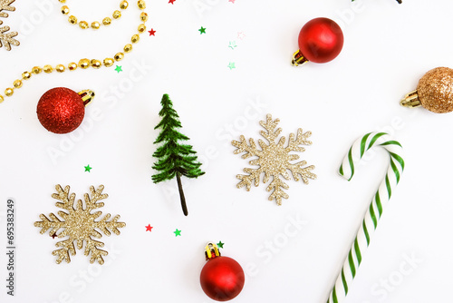 Christmas tree ornaments on white background. Christmas, winter, new year concept. Flat lay, top view, copy space.