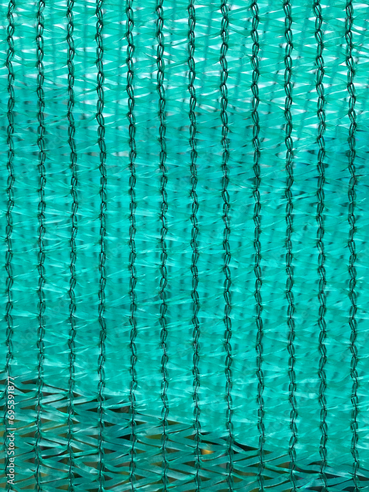 Sun Shade Net, Slan fabric used to filter the light for the plants pattern for background.