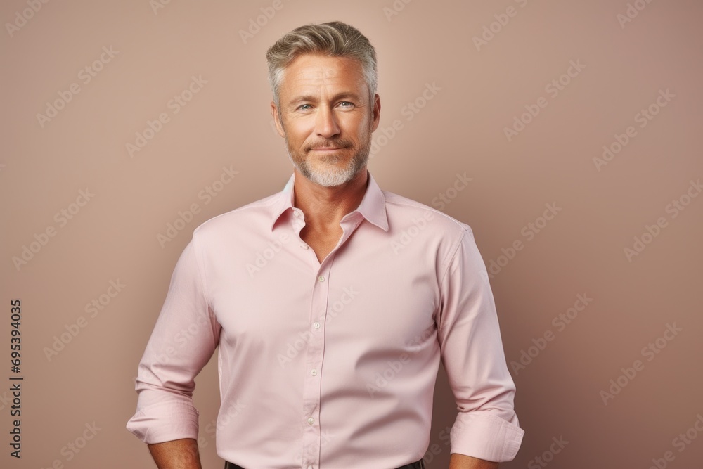 Portrait of a content man in his 40s donning a classy polo shirt against a pastel brown background. AI Generation Portrait of a content man in his 40s donning a classy polo shirt against a pastel brown background. AI Generation