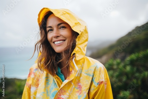 Portrait of a blissful woman in her 30s wearing a vibrant raincoat against a tropical island background. AI Generation © Markus Schröder