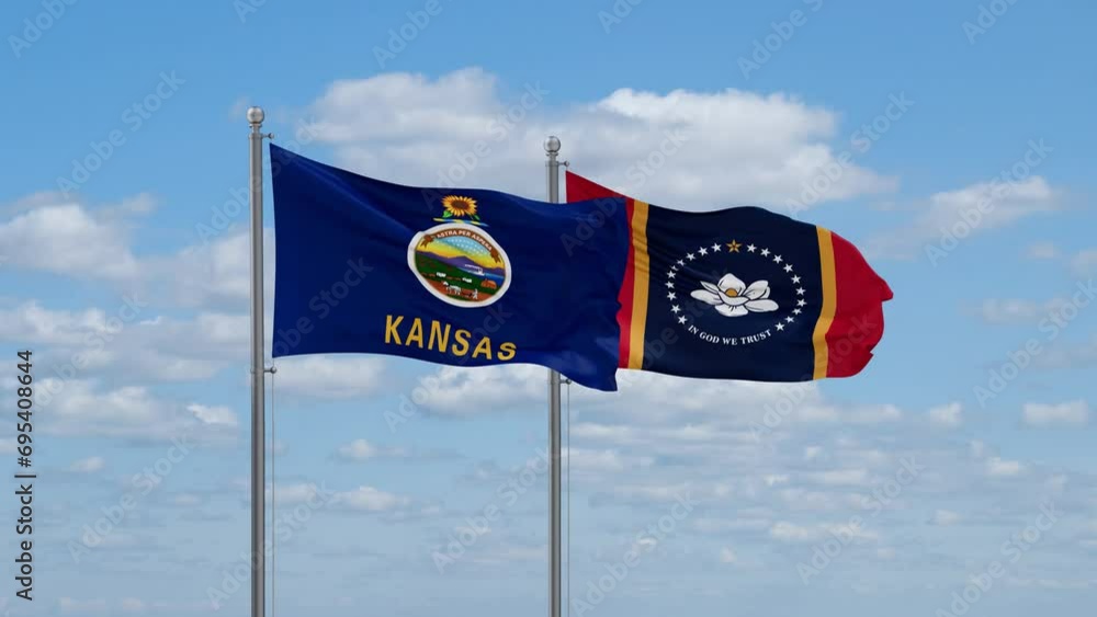 Mississippi and Kansas US state flags waving together on cloudy sky, endless seamless loop Mississippi and Kansas US state flags waving together on cloudy sky, endless seamless loop