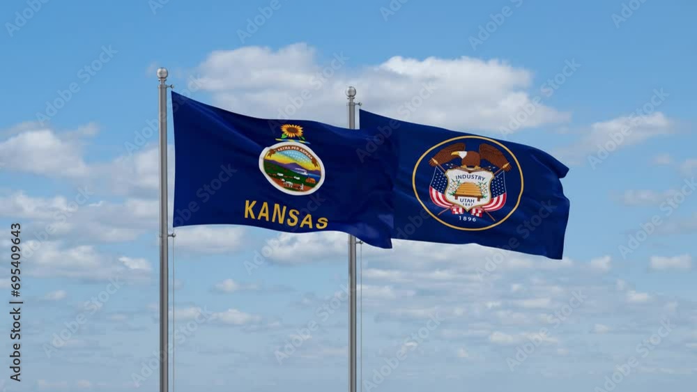 Utah and Kansas US state flags waving together on cloudy sky, endless seamless loop Utah and Kansas US state flags waving together on cloudy sky, endless seamless loop