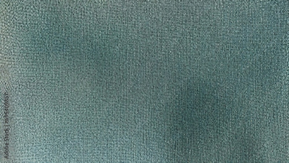 close up of a fabric texture in green color close up of a fabric texture in green color