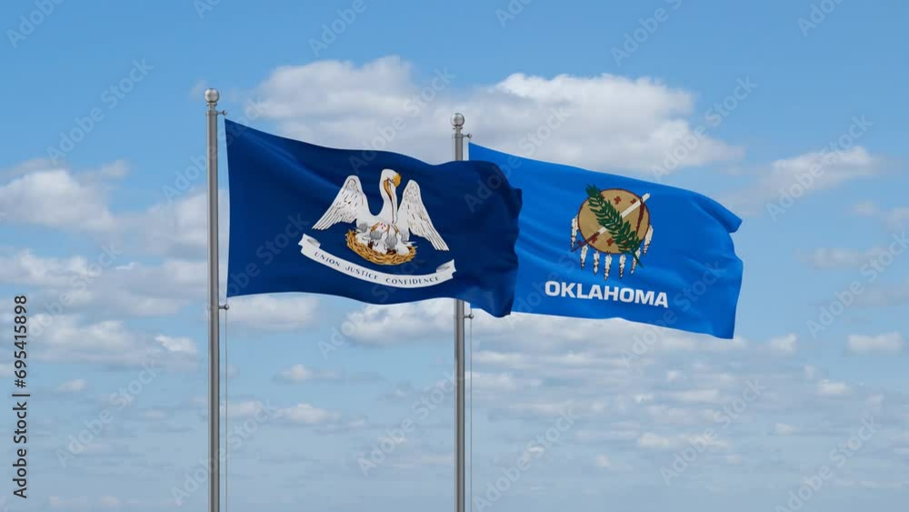 Oklahoma and Louisiana US state flags waving together on cloudy sky, endless seamless loop Oklahoma and Louisiana US state flags waving together on cloudy sky, endless seamless loop
