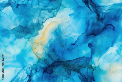  a painting of blue and yellow colors on a white and blue background that looks like a liquid or substance with a yellow line in the middle of the bottom right side of the image. © Nadia