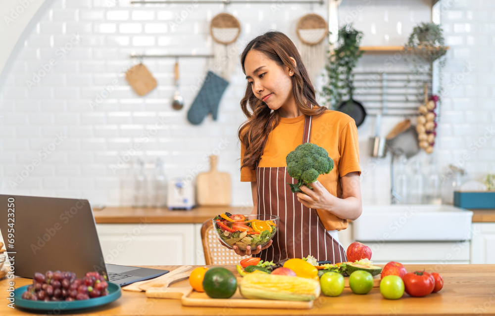 Portrait happy beauty slim healthy asian woman and vegan food healthy fresh vegetable and fruit in kitchen.diet, vegetarian, eating, fruit, wellness, health, green food.Fitness, healthy food Portrait happy beauty slim healthy asian woman and vegan food healthy fresh vegetable and fruit in kitchen.diet, vegetarian, eating, fruit, wellness, health, green food.Fitness, healthy food