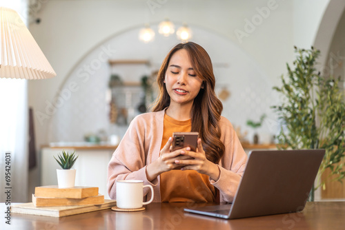 Woman use smartphone playing, shopping, social media communication and digital online, work, online social media, online marketing, technology, chat, post, like, follow on phone screen at home