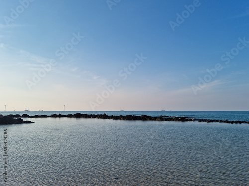  This is Gwakji Beach with blue sky and sea. © binimin