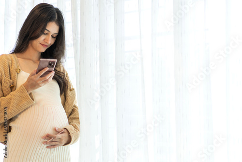 Happy smiling Mother woman hugging and smiling expecting with pregnancy hold baby in belly, woman pregnant, birth, preparation, maternity, care with childbirth at home.Love of family Free Download Happy smiling Mother woman hugging and smiling expecting with pregnancy hold baby in belly, woman pregnant, birth, preparation, maternity, care with childbirth at home.Love of family - GFXLoad