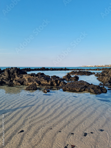 This is a Jeju seascape with basalt rocks.