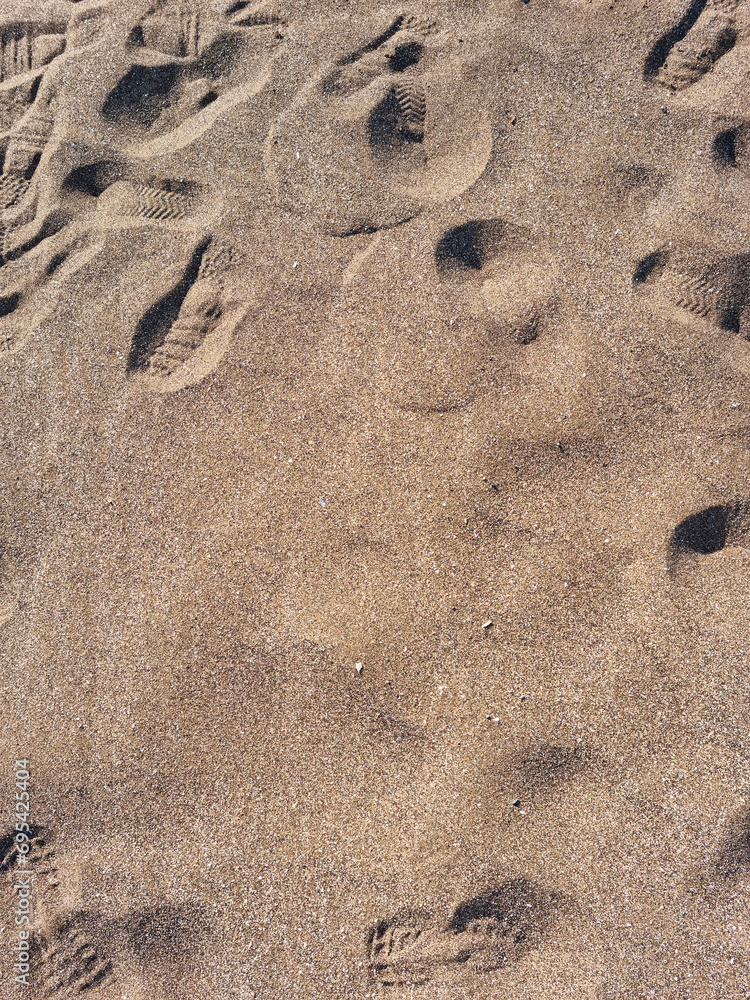 
These are shoe prints in the sand.