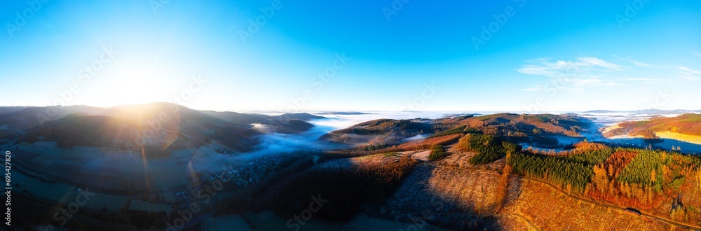the landscape of the siegerland in germany in winter from above panorama