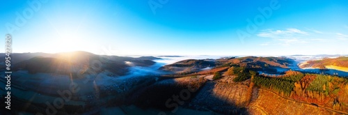 the landscape of the siegerland in germany in winter from above panorama