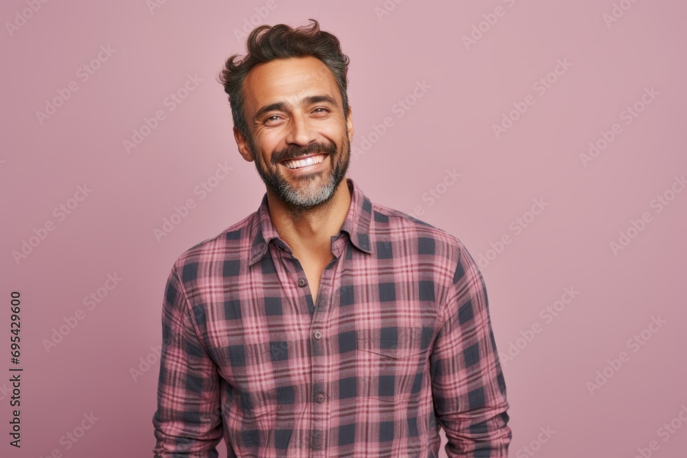 Portrait of a content man in his 40s wearing a comfy flannel shirt against a pastel or soft colors background. AI Generation Portrait of a content man in his 40s wearing a comfy flannel shirt against a pastel or soft colors background. AI Generation
