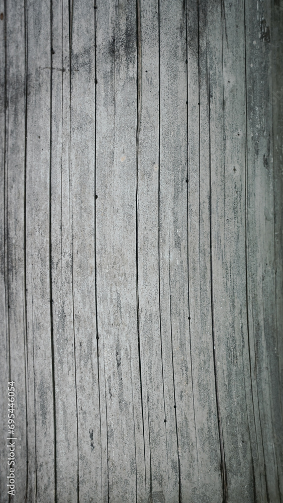 Naklejka premium Empty dark grey wood natural wall panel ,abstract wood background and texture. patterns, quoit, old, broken, ancient, rotted,obsolete weathered cracked , space for work, vintage wallpaper, close up