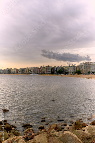 Landscape view of the city of Montevideo in the area of Pocitos. Tourist place in Uruguay, sunset on a cloudy day. photo