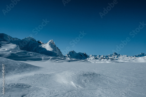 Inverno sul Chuebodengletscher, Ticino, Svizzera. Sullo sfondo le alpi del Canton Vallese photo