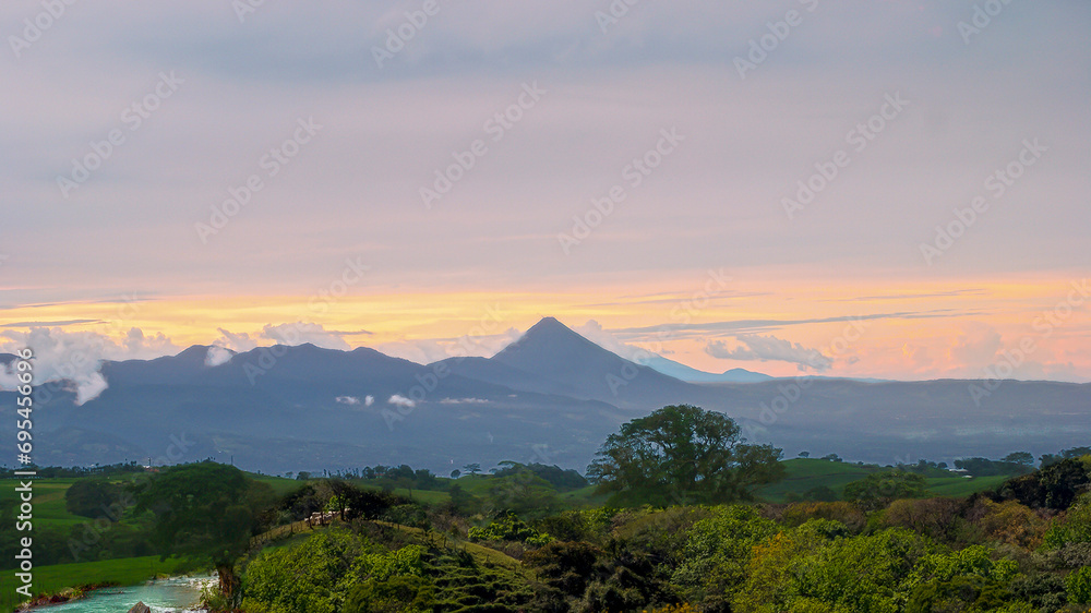 Fototapeta premium Arenal Volcano, forest, rivers, cattle, imposing, impressive
