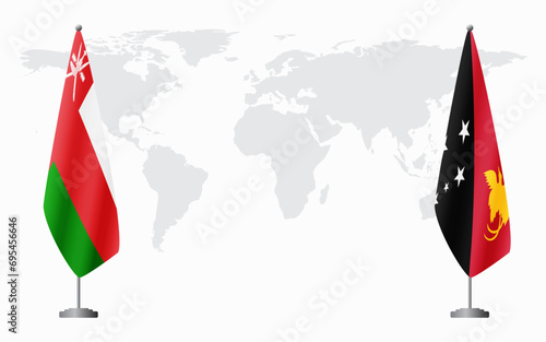 Oman and Papua New Guinea flags for official meeting