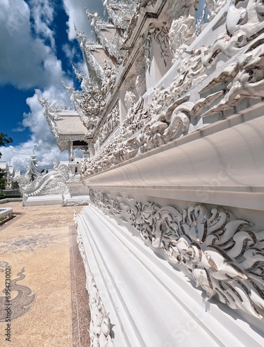 Wat Rong Khun decorative railing and roofs side view