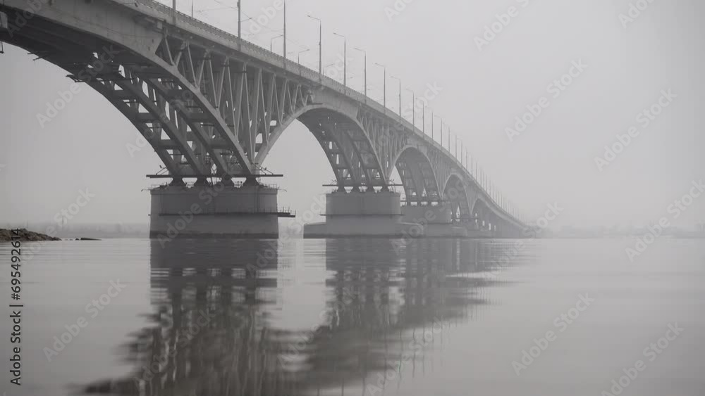 Mystical bridge over the Volga river in fog Saratov, Russia Mystical bridge over the Volga river in fog Saratov, Russia