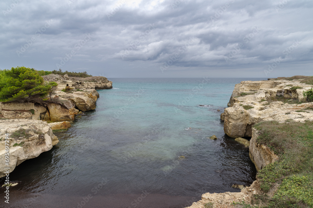 Grotta della Poesia coast cliff, Salento, Apulia, Italy Grotta della Poesia coast cliff, Salento, Apulia, Italy