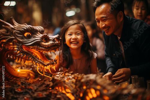 Chinese Family Celebrating the Chinese Lunar New Year 2024, Year of the Wooden Dragon with Cultural Heritage © Simn