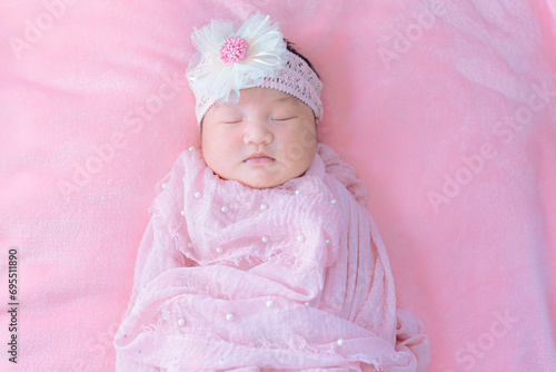 Baby girl in pink skirt,Baby girl in a pink skirt. Selective focus. People,Baby girl newborn in pink tutu  photo