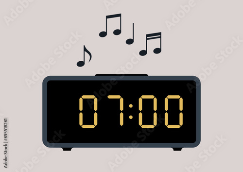 A home gadget - an alarm clock with digital display playing a melodic tune
