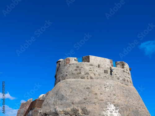 Detail view. The castle of Santa Barbara on the volcanic hilltop of Guanapay mountain.Teguise, Lanzarote, Spain.