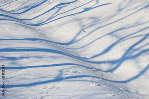 closeup white snow with long shadow, winter outdoor natural background
