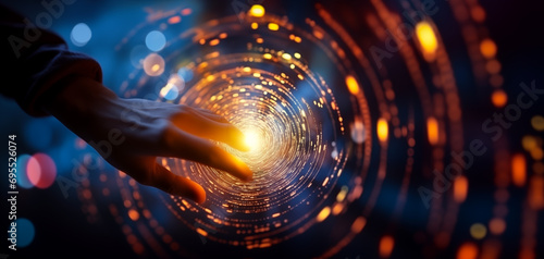 First contact, with hand touching spinning vortex of light particles, neuronal network concept photo
