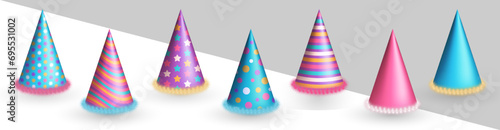Collection of three dimensional realistic bright colorful birthday hats or party paper caps in cone shape with fluffy fur. Purple, blue and pink party hats clipart for celebration event, anniversary