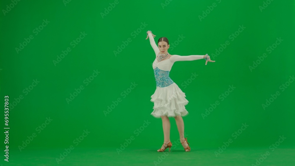 Latin Ballroom Dancer in Pose Against Green Screen Latin Ballroom Dancer in Pose Against Green Screen