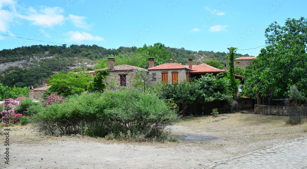 The historical Adatepe Village, located in Canakkale, Turkey, attracts attention with its old houses, mosque and fountain built during the Ottoman period. It is an important tourism region.