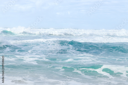 Blue big waves on the Atlantic ocean. The Praia da Ursa beach near Cabo da Roca (Cape Roca). The westernmost point of mainland Europe. photo