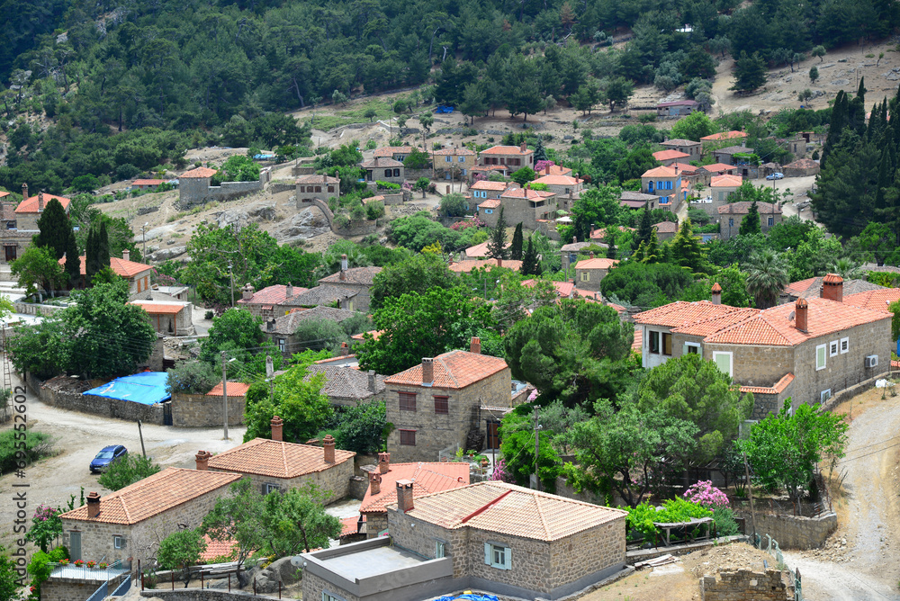 The historical Adatepe Village, located in Canakkale, Turkey, attracts attention with its old houses, mosque and fountain built during the Ottoman period. It is an important tourism region.