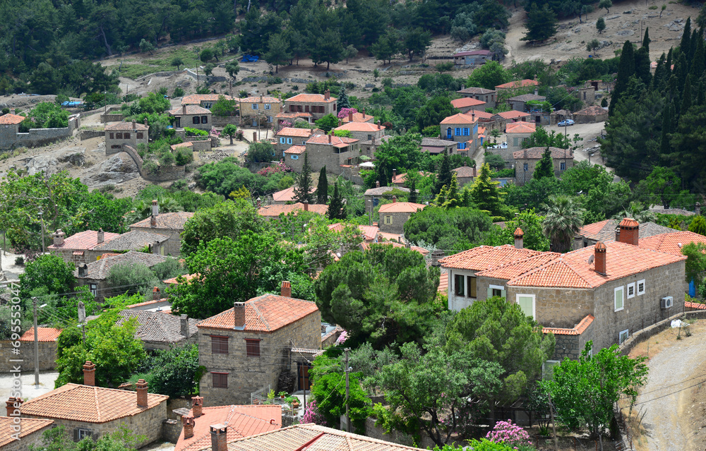 The historical Adatepe Village, located in Canakkale, Turkey, attracts attention with its old houses, mosque and fountain built during the Ottoman period. It is an important tourism region.