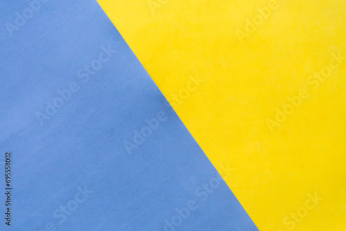 Yellow and blue geometric paper background © eugen