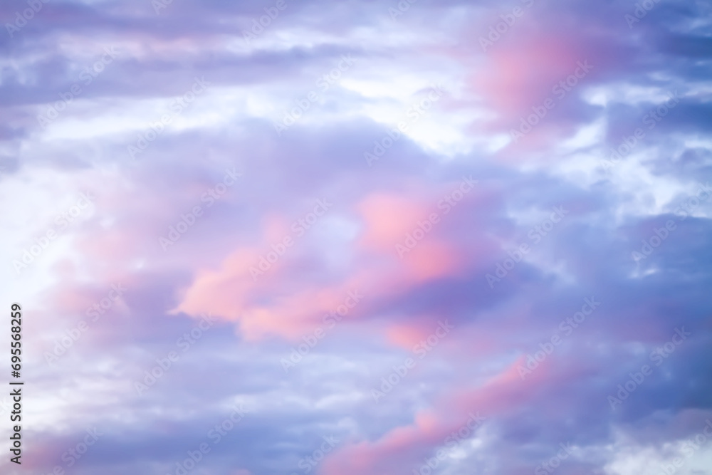 Obraz premium Bright sunset sky with gentle colorful clouds.