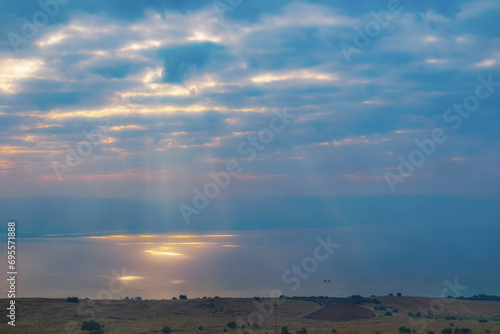 Sunspots on the surface of the water of the Sea of Galilee (lake Kinneret). 