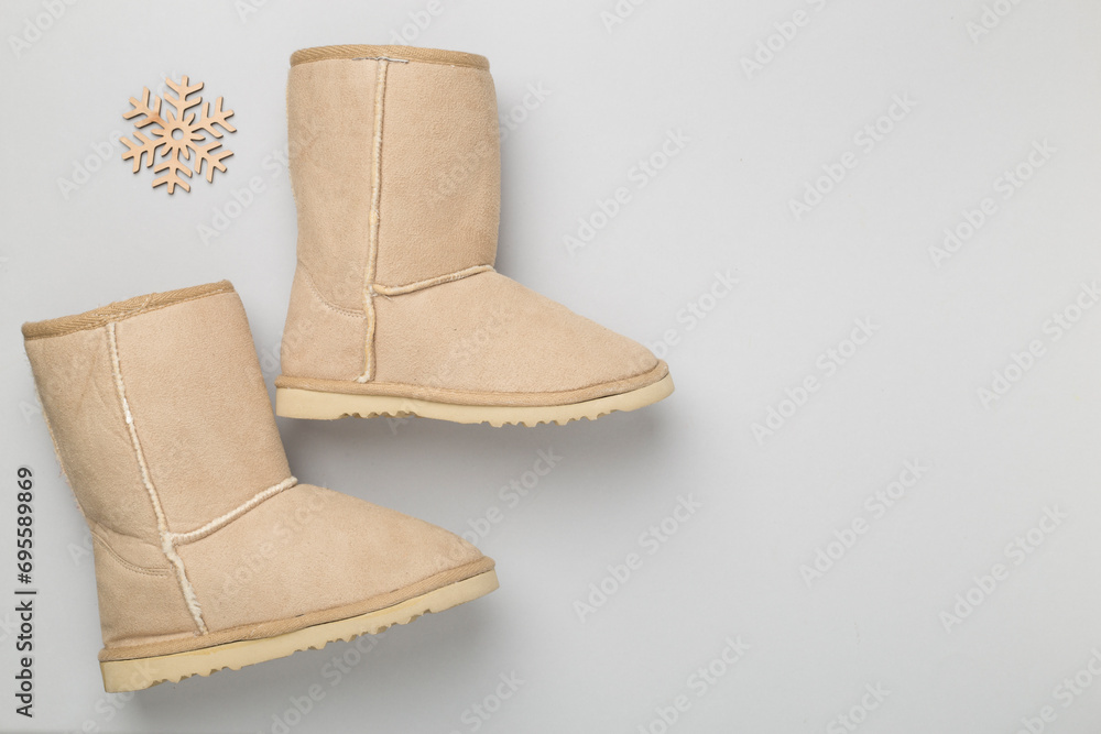 Beautiful boots on color background,top view Beautiful boots on color background,top view