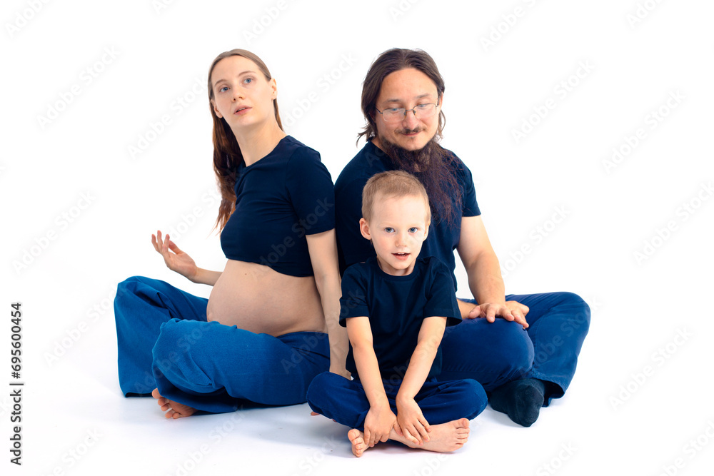 beautiful european happy family with a pregnant mother, the father and a son together. High quality photo beautiful european happy family with a pregnant mother, the father and a son together. High quality photo