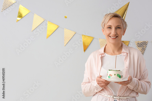 Mature woman with birthday ...