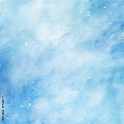 Abstract blue watercolor background with soft cloud-like patterns and paint splatters