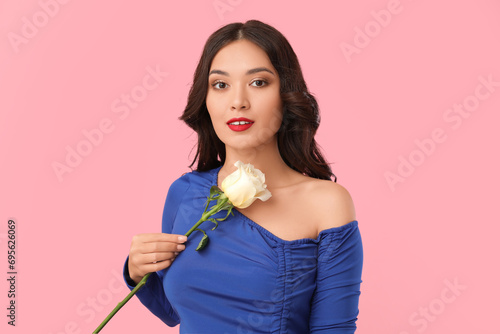 Young woman in blue off-sho...